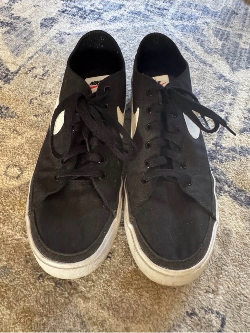 Nike Men’s Black Sneakers with White Swoosh